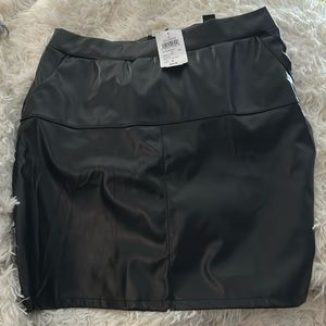 black mini-midi leather skirt brand new never worn. still has tags.